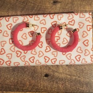 Bright pink textured fabric hoop earring